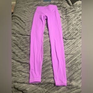 Lululemon Wunder Train High-Rise Tight 28" in color Moonlight Magenta size 4